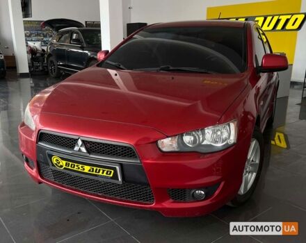 Красный Мицубиси Лансер, объемом двигателя 1.8 л и пробегом 140 тыс. км за 7800 $, фото 2 на Automoto.ua