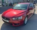 Червоний Міцубісі Lancer, об'ємом двигуна 1.8 л та пробігом 242 тис. км за 5800 $, фото 1 на Automoto.ua