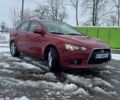 Красный Мицубиси Лансер, объемом двигателя 1.8 л и пробегом 282 тыс. км за 9300 $, фото 1 на Automoto.ua
