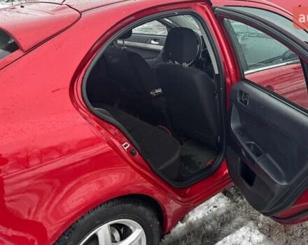 Красный Мицубиси Лансер, объемом двигателя 1.8 л и пробегом 282 тыс. км за 9300 $, фото 36 на Automoto.ua