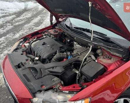 Красный Мицубиси Лансер, объемом двигателя 1.8 л и пробегом 282 тыс. км за 9300 $, фото 38 на Automoto.ua