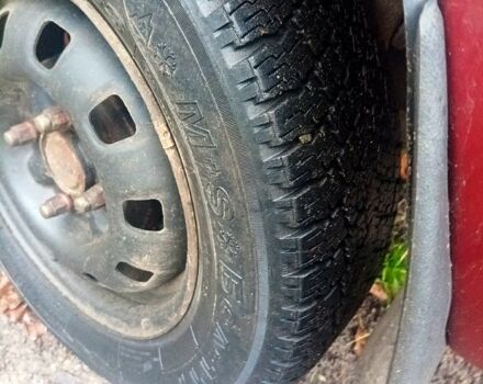 Красный Мицубиси Лансер, объемом двигателя 1.5 л и пробегом 310 тыс. км за 600 $, фото 6 на Automoto.ua