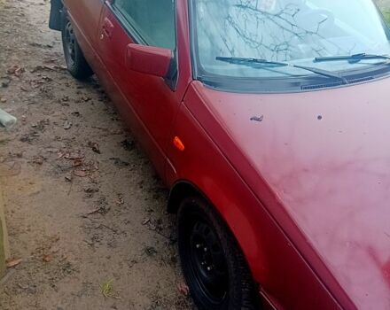 Красный Мицубиси Лансер, объемом двигателя 1.5 л и пробегом 310 тыс. км за 600 $, фото 3 на Automoto.ua