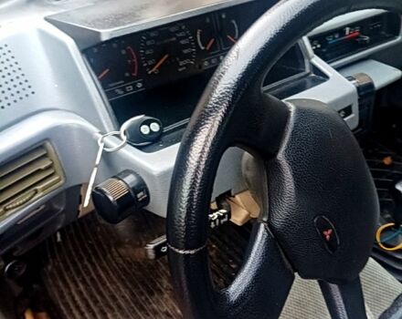 Красный Мицубиси Лансер, объемом двигателя 1.5 л и пробегом 310 тыс. км за 600 $, фото 8 на Automoto.ua