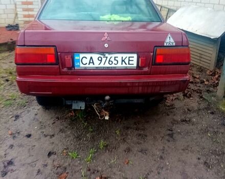 Красный Мицубиси Лансер, объемом двигателя 1.5 л и пробегом 310 тыс. км за 600 $, фото 4 на Automoto.ua