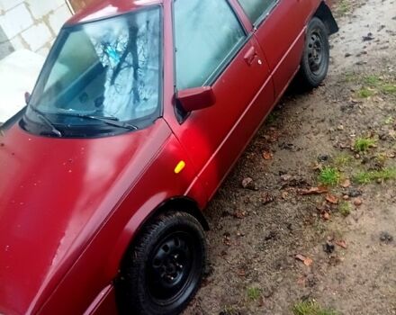 Красный Мицубиси Лансер, объемом двигателя 1.5 л и пробегом 310 тыс. км за 600 $, фото 5 на Automoto.ua