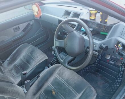 Красный Мицубиси Лансер, объемом двигателя 1.5 л и пробегом 222 тыс. км за 700 $, фото 5 на Automoto.ua