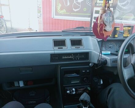 Красный Мицубиси Лансер, объемом двигателя 1.5 л и пробегом 222 тыс. км за 700 $, фото 4 на Automoto.ua