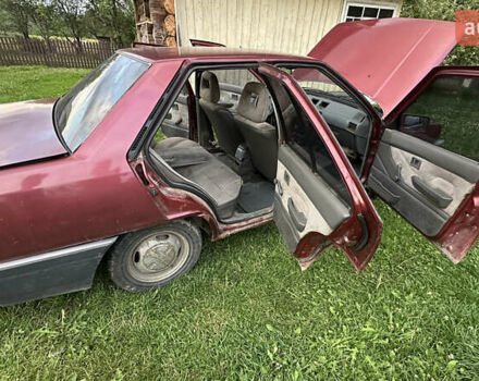 Червоний Міцубісі Lancer, об'ємом двигуна 1.5 л та пробігом 326 тис. км за 800 $, фото 10 на Automoto.ua