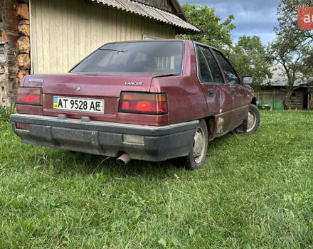 Червоний Міцубісі Lancer, об'ємом двигуна 1.5 л та пробігом 326 тис. км за 800 $, фото 3 на Automoto.ua