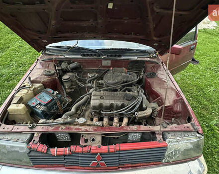 Червоний Міцубісі Lancer, об'ємом двигуна 1.5 л та пробігом 326 тис. км за 800 $, фото 8 на Automoto.ua