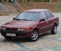 Красный Мицубиси Лансер, объемом двигателя 1.5 л и пробегом 400 тыс. км за 1500 $, фото 1 на Automoto.ua