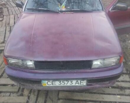 Красный Мицубиси Лансер, объемом двигателя 1.5 л и пробегом 350 тыс. км за 1300 $, фото 2 на Automoto.ua