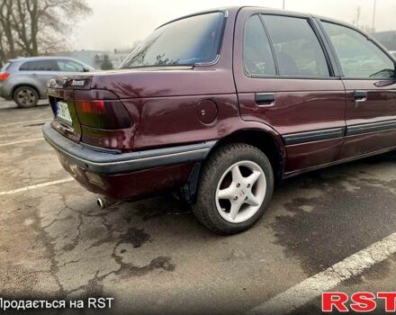 Красный Мицубиси Лансер, объемом двигателя 1.2 л и пробегом 420 тыс. км за 1900 $, фото 7 на Automoto.ua