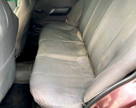 Красный Мицубиси Лансер, объемом двигателя 1.2 л и пробегом 420 тыс. км за 1900 $, фото 11 на Automoto.ua