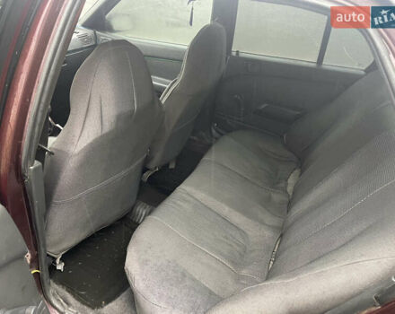 Красный Мицубиси Лансер, объемом двигателя 1.2 л и пробегом 220 тыс. км за 1300 $, фото 6 на Automoto.ua