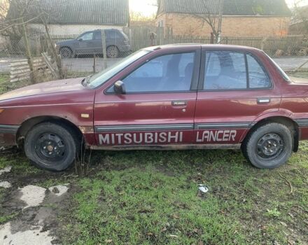 Красный Мицубиси Лансер, объемом двигателя 0 л и пробегом 200 тыс. км за 355 $, фото 1 на Automoto.ua