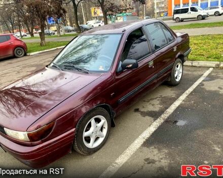 Красный Мицубиси Лансер, объемом двигателя 1.2 л и пробегом 420 тыс. км за 1900 $, фото 1 на Automoto.ua