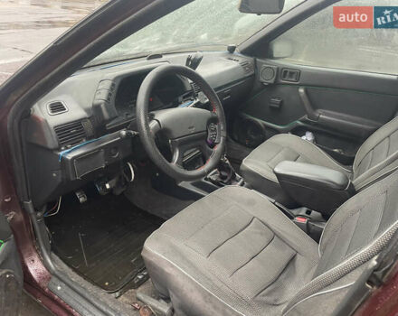 Красный Мицубиси Лансер, объемом двигателя 1.2 л и пробегом 220 тыс. км за 1300 $, фото 7 на Automoto.ua