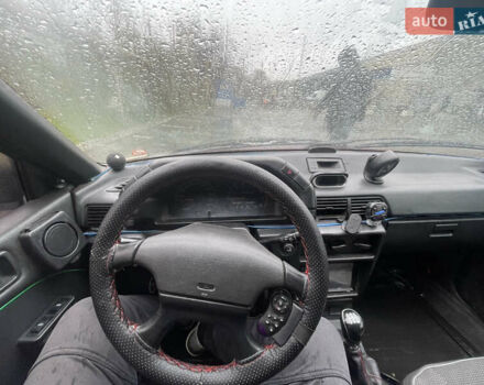 Красный Мицубиси Лансер, объемом двигателя 1.2 л и пробегом 220 тыс. км за 1300 $, фото 5 на Automoto.ua