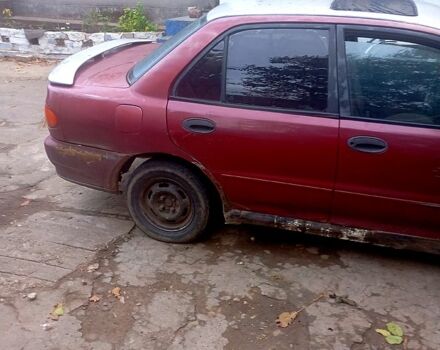 Червоний Міцубісі Lancer, об'ємом двигуна 1.6 л та пробігом 24 тис. км за 650 $, фото 1 на Automoto.ua