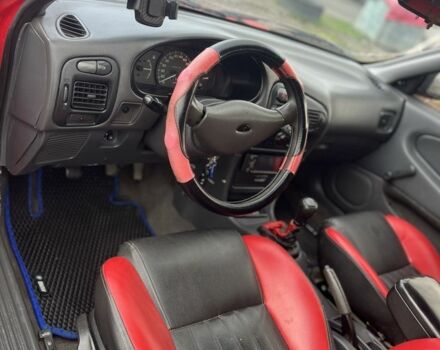 Червоний Міцубісі Lancer, об'ємом двигуна 1.3 л та пробігом 390 тис. км за 1500 $, фото 4 на Automoto.ua