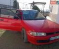 Червоний Міцубісі Lancer, об'ємом двигуна 1.3 л та пробігом 100 тис. км за 1200 $, фото 1 на Automoto.ua