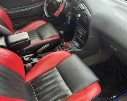 Червоний Міцубісі Lancer, об'ємом двигуна 1.3 л та пробігом 390 тис. км за 1500 $, фото 2 на Automoto.ua