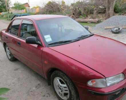 Червоний Міцубісі Lancer, об'ємом двигуна 2 л та пробігом 300 тис. км за 3000 $, фото 2 на Automoto.ua