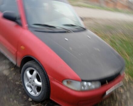 Красный Мицубиси Лансер, объемом двигателя 6 л и пробегом 1 тыс. км за 1200 $, фото 1 на Automoto.ua