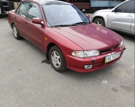 Красный Мицубиси Лансер, объемом двигателя 1.6 л и пробегом 233 тыс. км за 1986 $, фото 2 на Automoto.ua