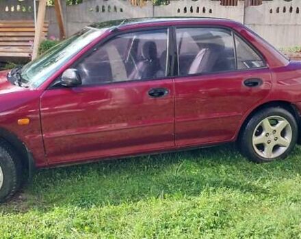 Червоний Міцубісі Lancer, об'ємом двигуна 1.3 л та пробігом 420 тис. км за 1900 $, фото 3 на Automoto.ua