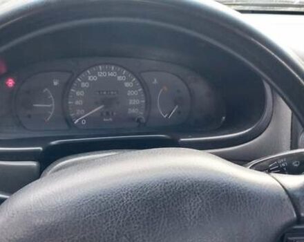 Червоний Міцубісі Lancer, об'ємом двигуна 1.3 л та пробігом 420 тис. км за 1900 $, фото 5 на Automoto.ua