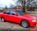Червоний Міцубісі Lancer, об'ємом двигуна 1.3 л та пробігом 409 тис. км за 2000 $, фото 1 на Automoto.ua