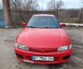 Красный Мицубиси Лансер, объемом двигателя 1.3 л и пробегом 409 тыс. км за 2000 $, фото 2 на Automoto.ua