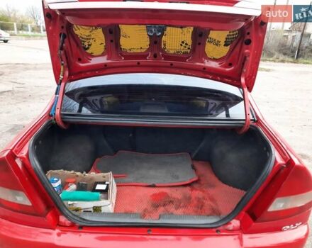 Красный Мицубиси Лансер, объемом двигателя 1.3 л и пробегом 409 тыс. км за 2000 $, фото 6 на Automoto.ua