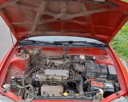 Красный Мицубиси Лансер, объемом двигателя 1.3 л и пробегом 336 тыс. км за 2900 $, фото 8 на Automoto.ua