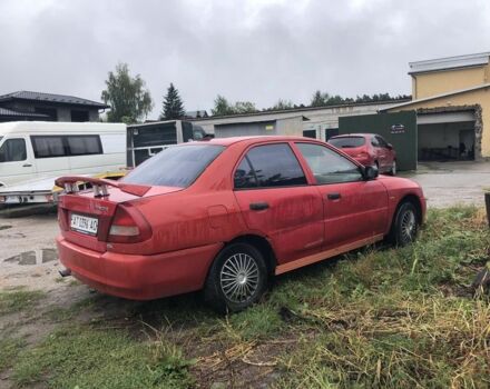 Червоний Міцубісі Lancer, об'ємом двигуна 1.5 л та пробігом 258 тис. км за 1100 $, фото 3 на Automoto.ua