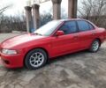 Красный Мицубиси Лансер, объемом двигателя 1.3 л и пробегом 409 тыс. км за 2000 $, фото 1 на Automoto.ua