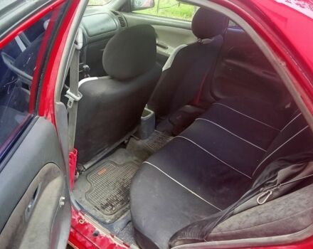 Червоний Міцубісі Lancer, об'ємом двигуна 1.3 л та пробігом 3 тис. км за 1079 $, фото 4 на Automoto.ua