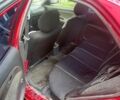 Червоний Міцубісі Lancer, об'ємом двигуна 1.3 л та пробігом 3 тис. км за 1079 $, фото 4 на Automoto.ua