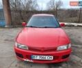 Красный Мицубиси Лансер, объемом двигателя 1.3 л и пробегом 409 тыс. км за 2000 $, фото 5 на Automoto.ua