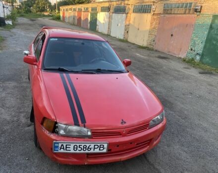 Красный Мицубиси Лансер, объемом двигателя 1.3 л и пробегом 330 тыс. км за 1200 $, фото 7 на Automoto.ua