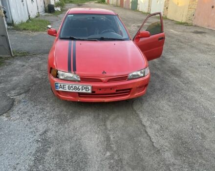 Красный Мицубиси Лансер, объемом двигателя 1.3 л и пробегом 330 тыс. км за 1200 $, фото 3 на Automoto.ua