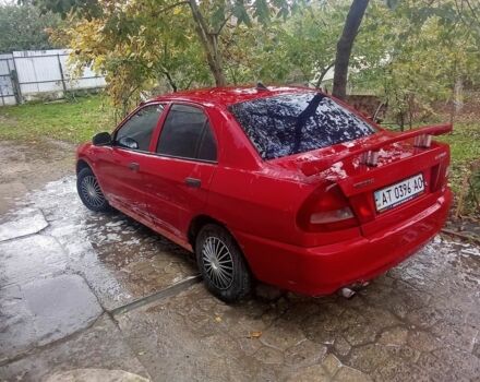 Червоний Міцубісі Lancer, об'ємом двигуна 1.3 л та пробігом 3 тис. км за 1079 $, фото 1 на Automoto.ua