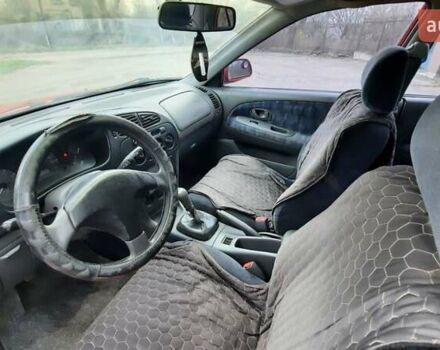 Красный Мицубиси Лансер, объемом двигателя 1.3 л и пробегом 409 тыс. км за 2000 $, фото 8 на Automoto.ua