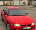 Червоний Міцубісі Lancer, об'ємом двигуна 1.3 л та пробігом 400 тис. км за 1350 $, фото 1 на Automoto.ua