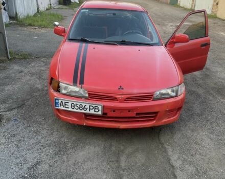 Красный Мицубиси Лансер, объемом двигателя 1.3 л и пробегом 330 тыс. км за 1200 $, фото 2 на Automoto.ua