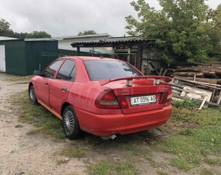 Червоний Міцубісі Lancer, об'ємом двигуна 1.5 л та пробігом 258 тис. км за 1100 $, фото 2 на Automoto.ua