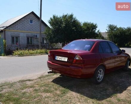 Красный Мицубиси Лансер, объемом двигателя 1.3 л и пробегом 396 тыс. км за 2800 $, фото 9 на Automoto.ua